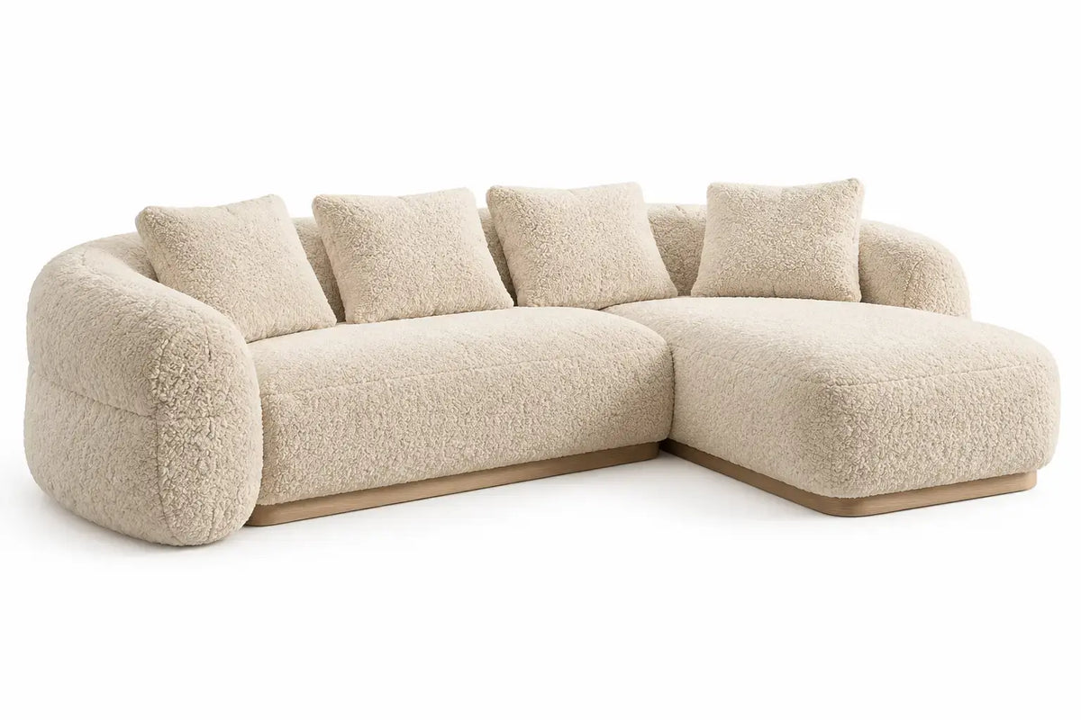 Soffa med förlängd schäslongdel – beige